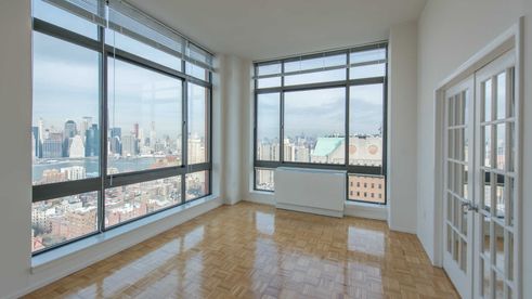 Model unit at 180 Montague Street with view of Manhattan