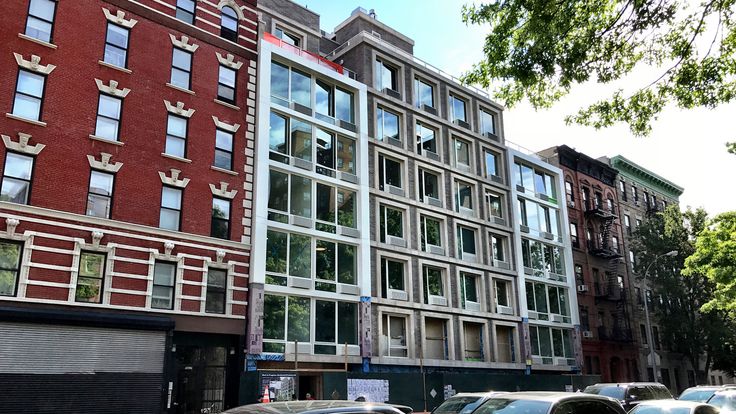 When complete, 109 East 115th Street will hold 32 rental apartments. Construction photos via CityRealty