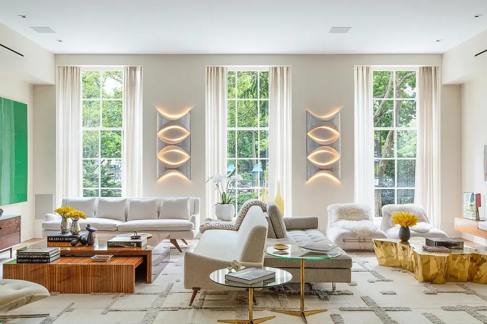 Living room with oversized windows overlooking Madison Square Park