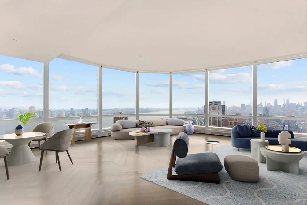 Living/dining room with Hudson River views