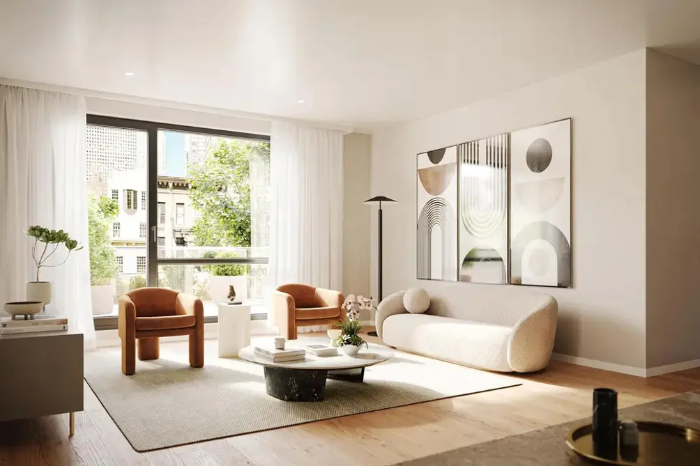 Living room with oversized window and hardwood floors