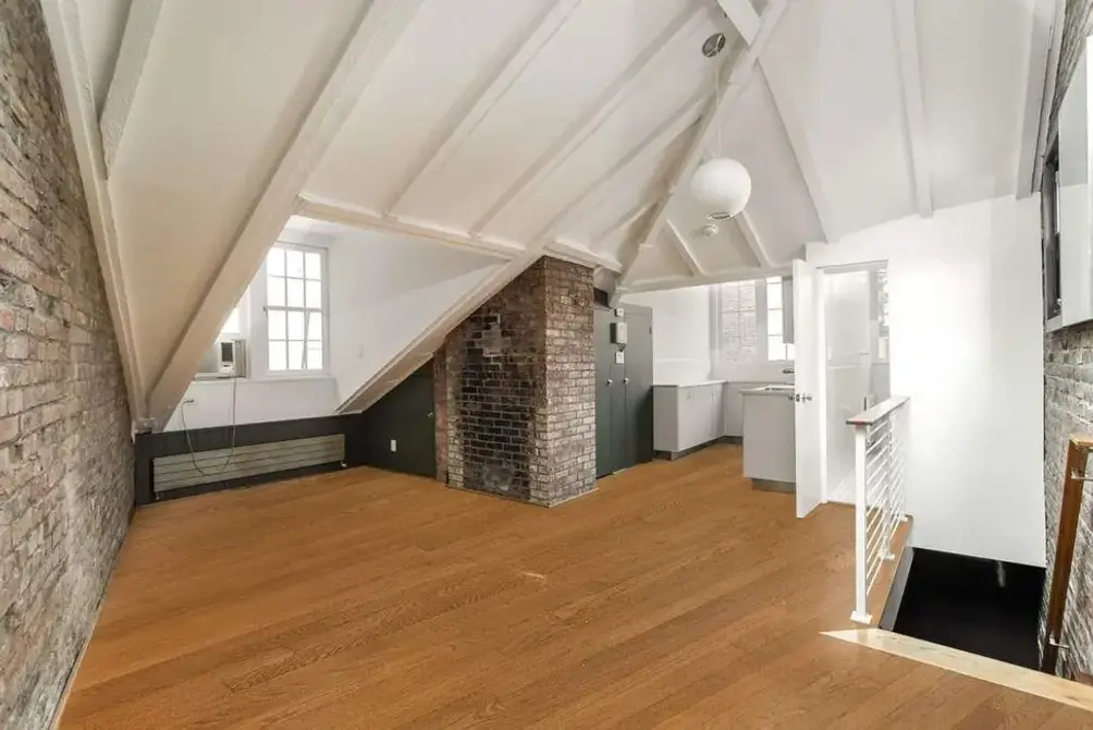 Top-floor studio with angled ceilings