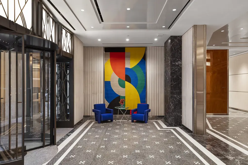Colorful tapestry in residential building's entrance