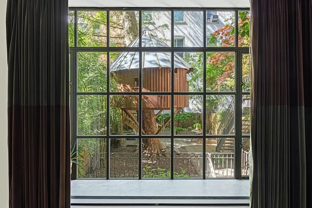The treehouse as seen through a window