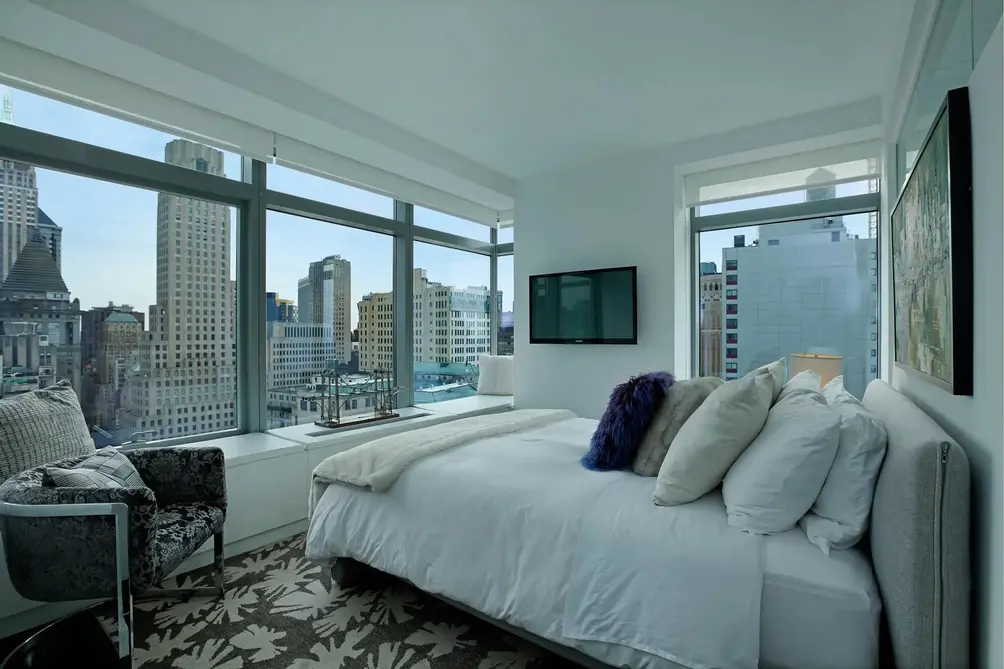 Corner bedroom with Lower Manhattan views