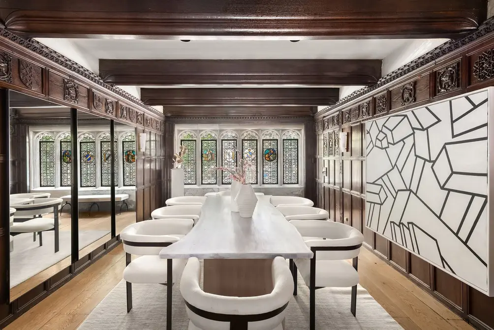 Formal dining room with stained glass windows