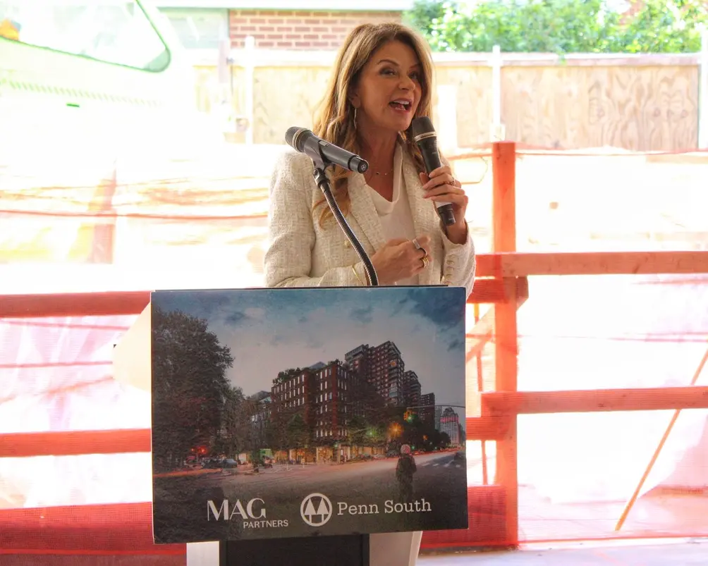 MaryAnne Gilmartin speaking at 335 Eighth Avenue topping out ceremony