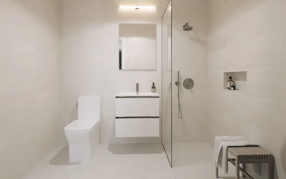 Primary bath with glass-enclosed shower