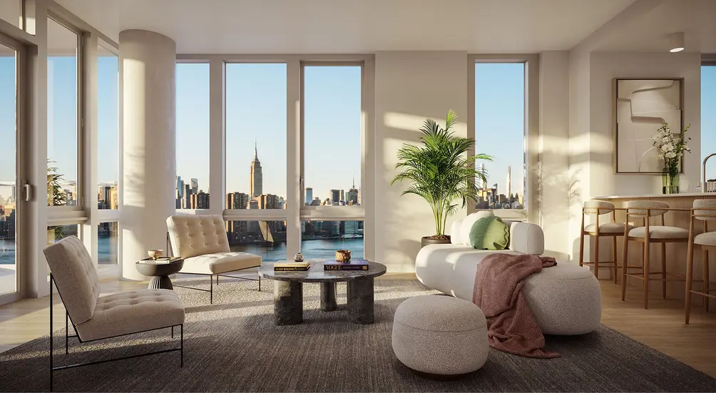 Living room with river and skyline views