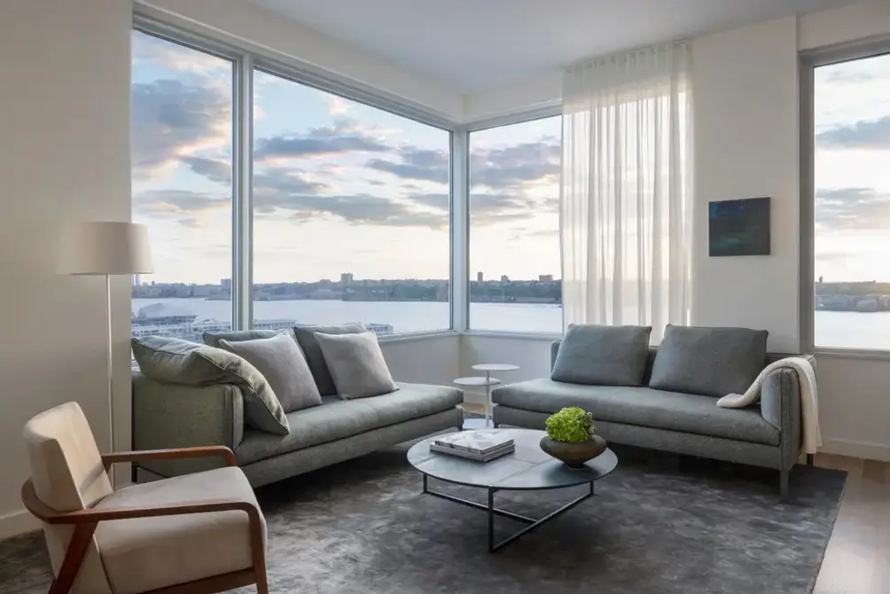 Corner living room with Hudson River views
