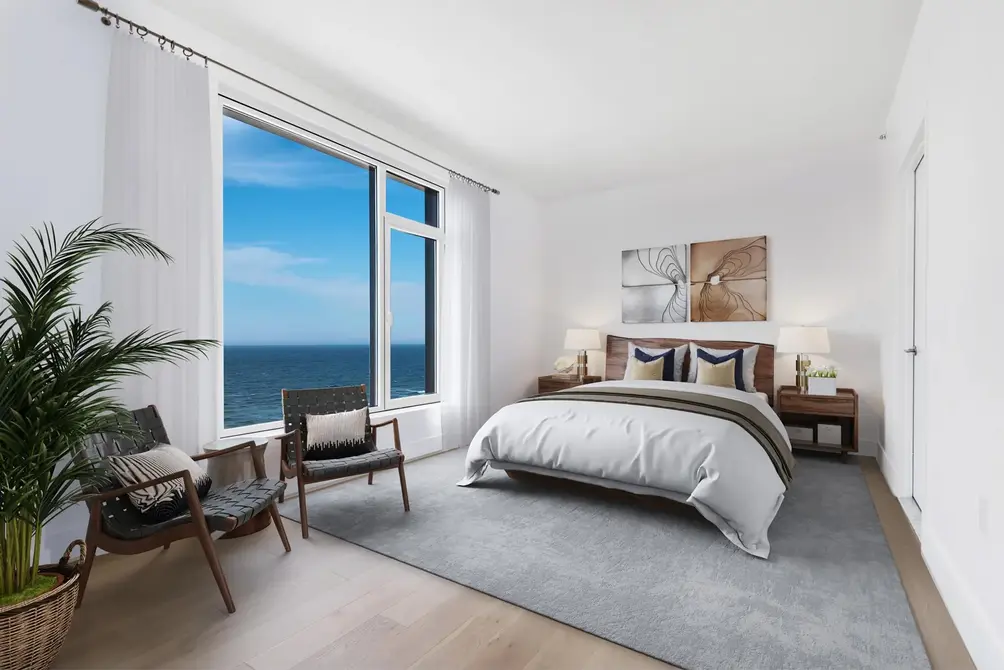 Primary bedroom with direct ocean views