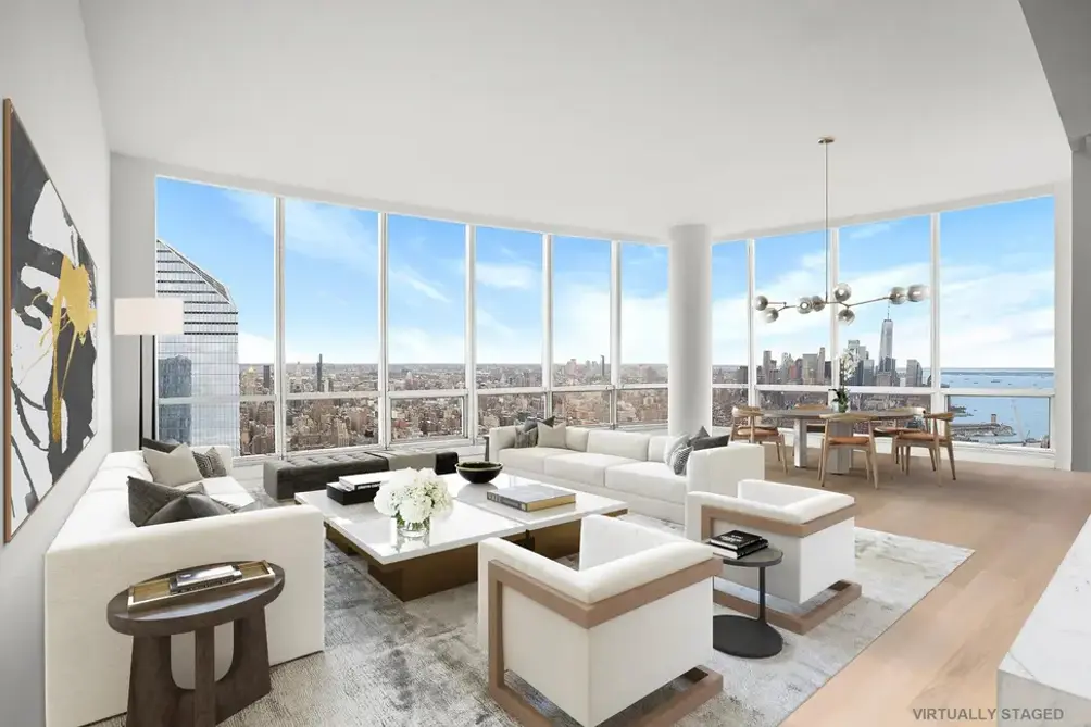 Corner living room with Hudson River and Lower Manhattan views