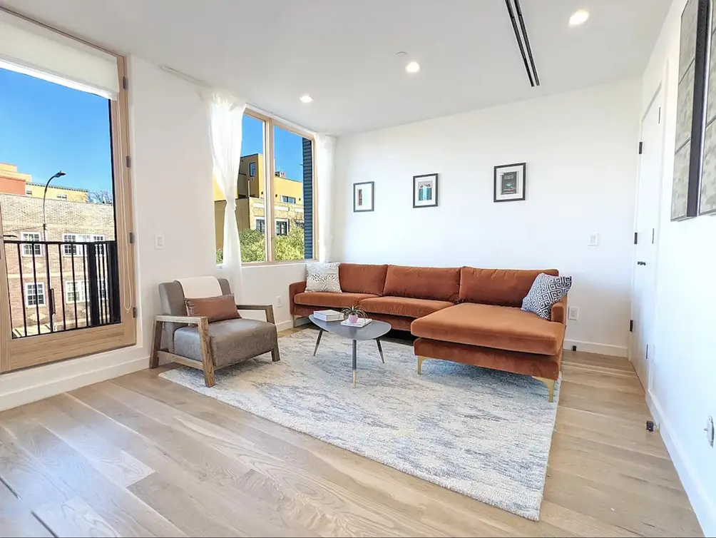 Living room with neighborhood views