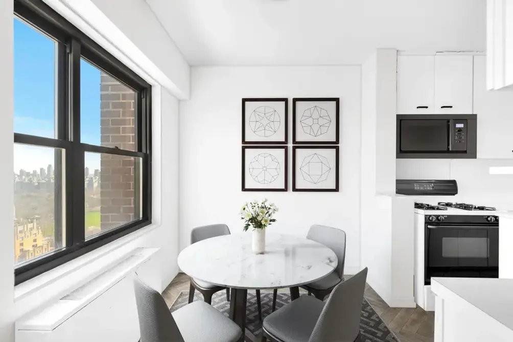Windowed dining area with open kitchen