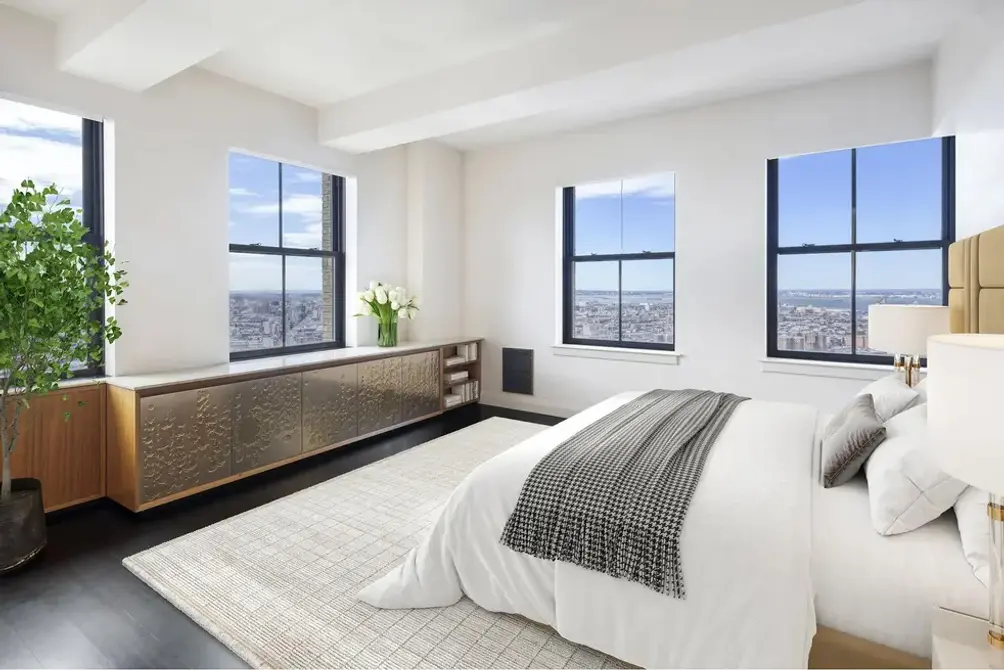 Bedroom with beamed ceiling and Brooklyn views