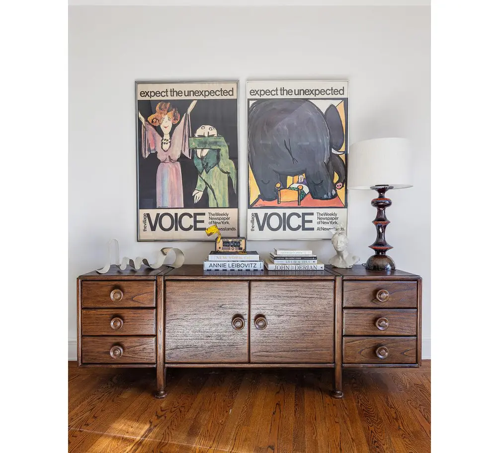 Village Voice posters on the wall
