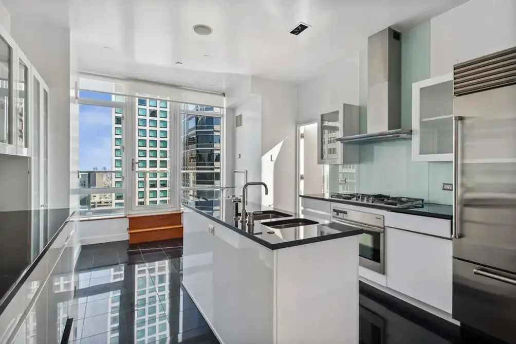 Windowed kitchen with view of 432 Park Avenue
