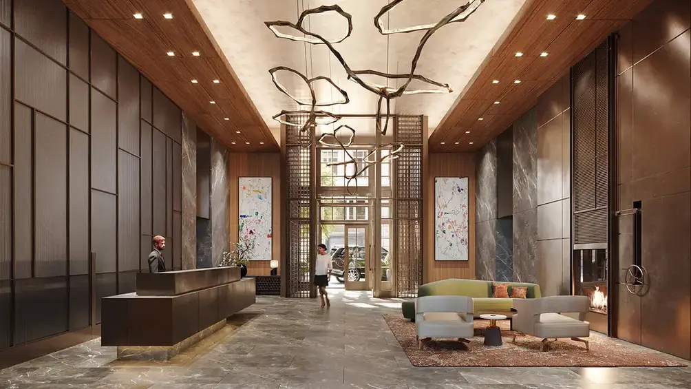 Residential lobby with bronze sculpture hanging from the ceiling