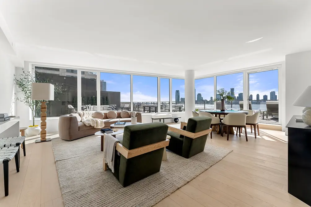 Corner living room with Hudson River views