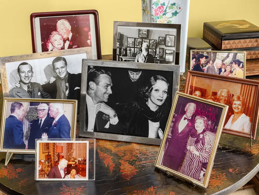 Personal photos on display in Douglas Fairbanks Jr.'s apartment