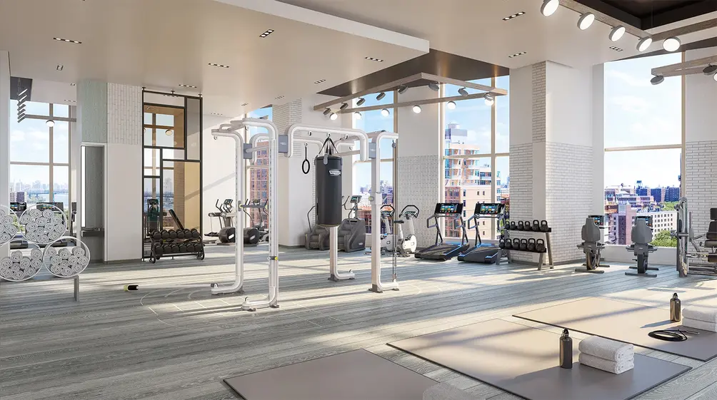 Fitness center with city views