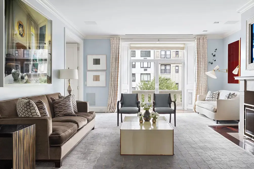 Living room with Park Avenue views and fireplace