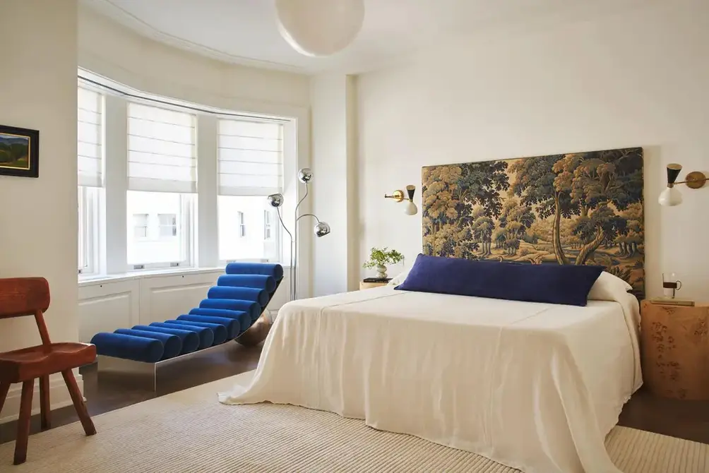 Primary bedroom with courtyard views