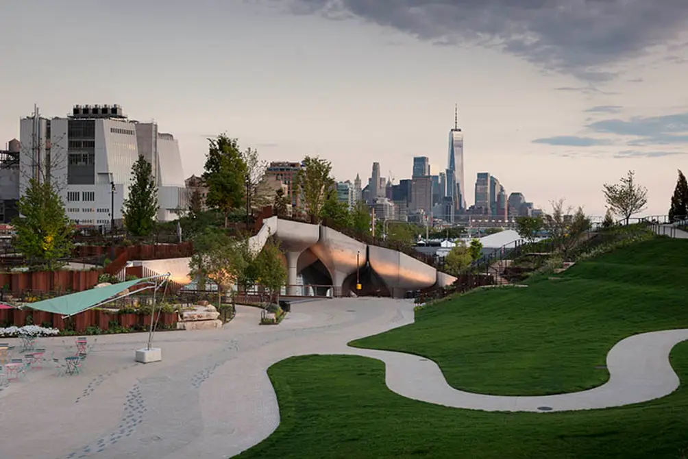 Little Island gathering space with views of pylons and Lower Manhattan skyline