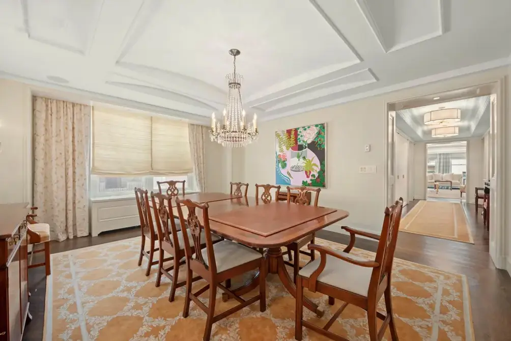 Formal dining room with coffered ceiling