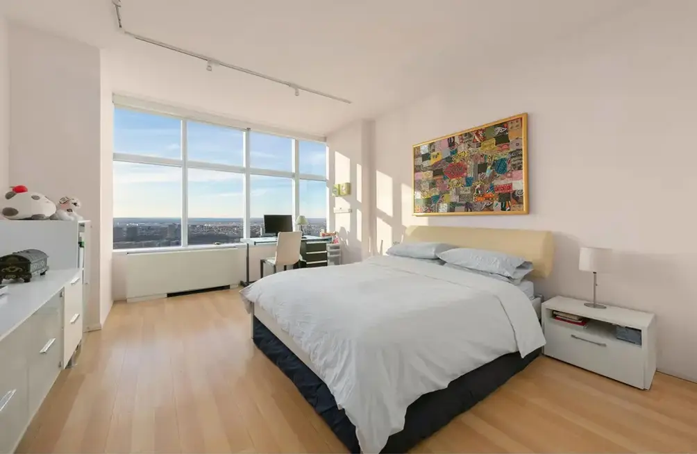 Primary bedroom with city views