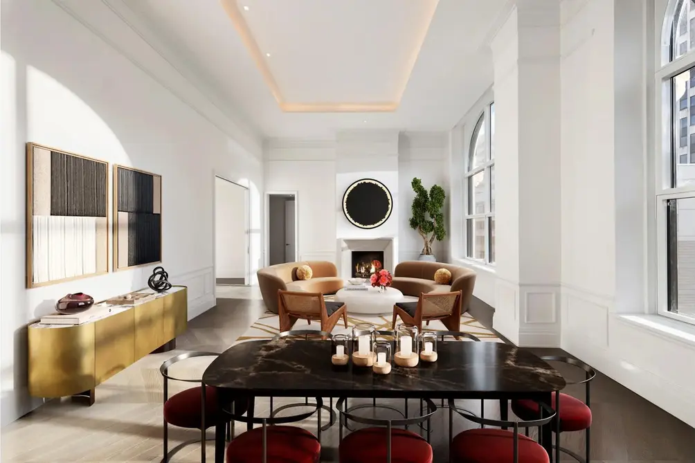 Living room with arched windows and fireplace