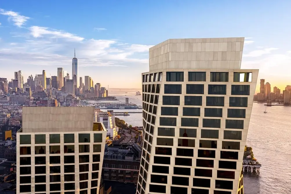 Two towers of One High Line development with the Empire State Building in between