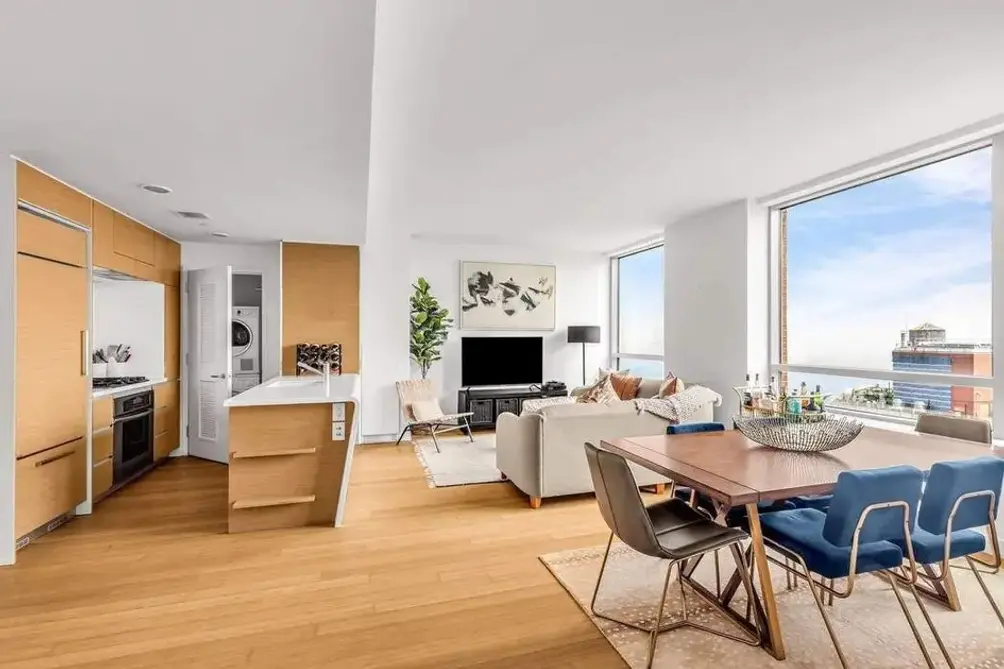 Living room with Battery Park City and river views
