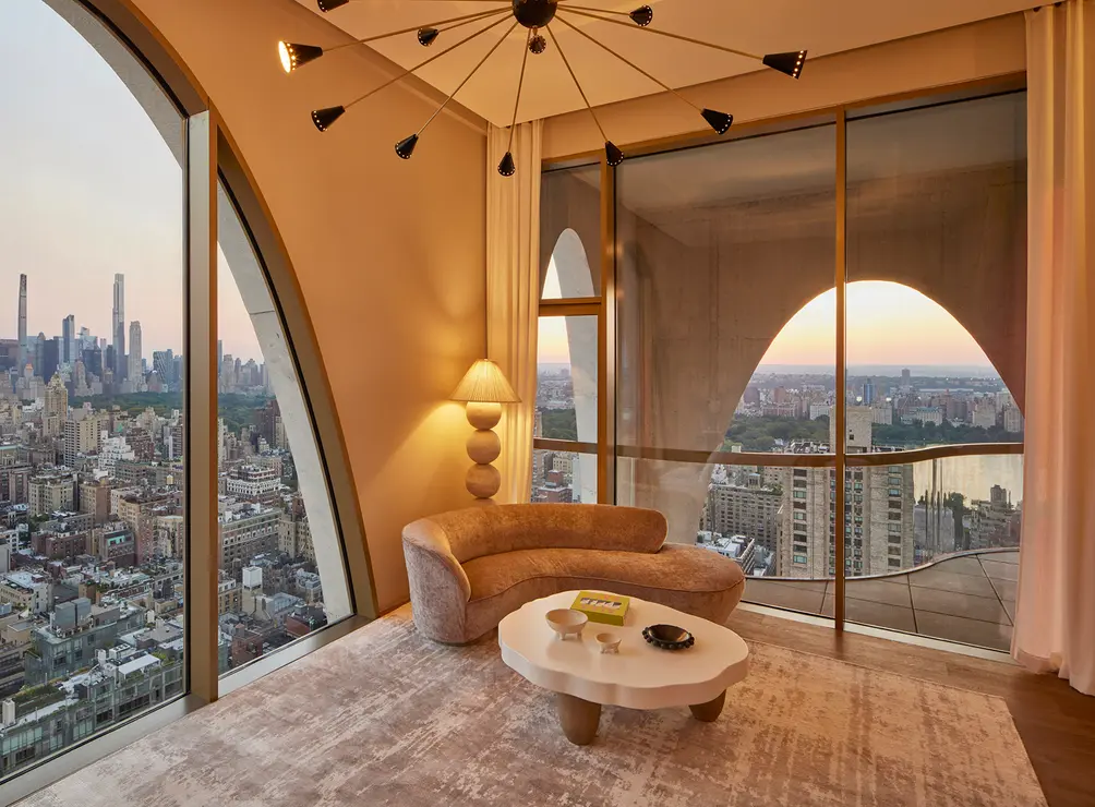 Penthouse living room with arched windows