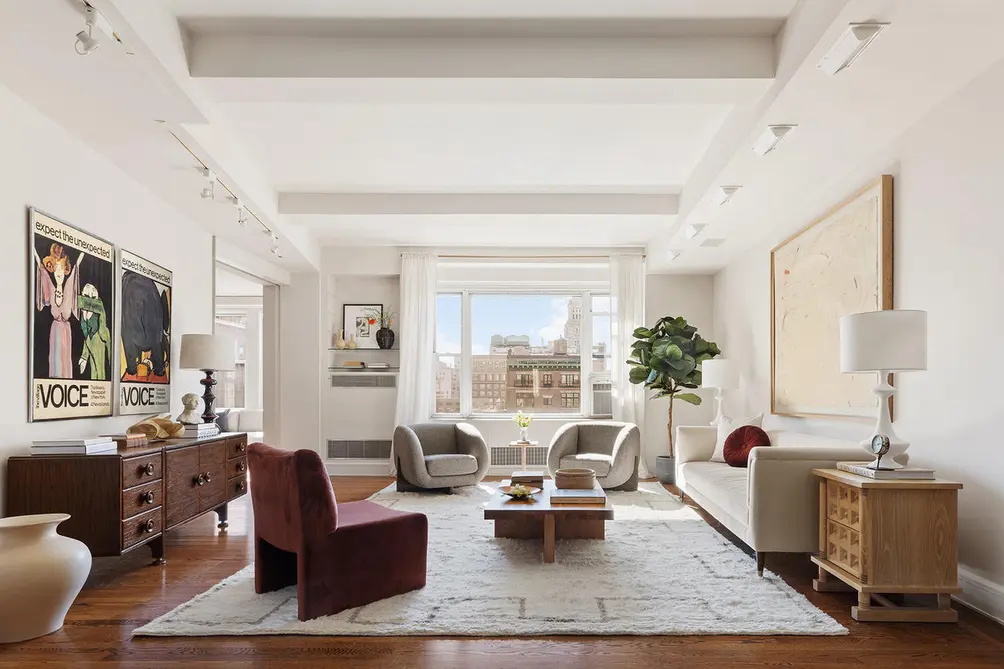 Living room with beamed ceiling, Village Voice posters, and Gramercy Park views