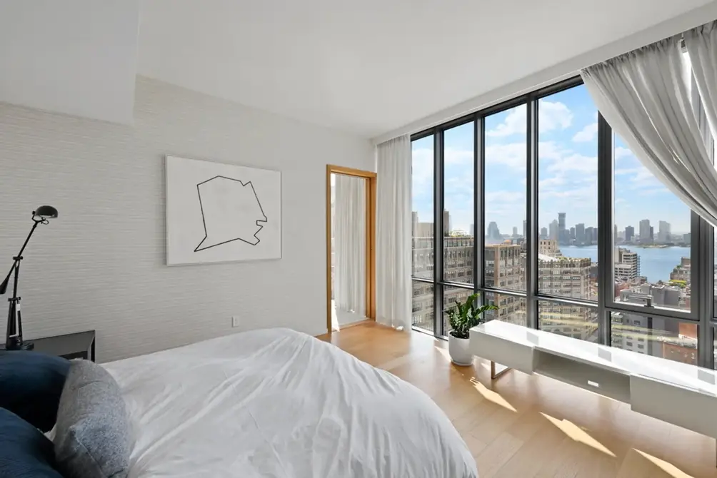 Primary bedroom with Lower Manhattan and Hudson River views