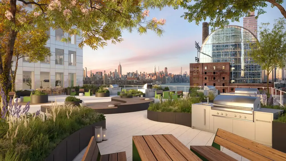 Roof terrace with outdoor kitchen and skyline views