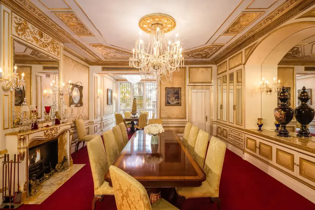 Formal dining room with gold detailing