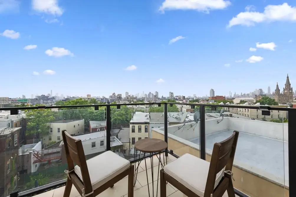 Private balcony with Greenpoint cityscape and Manhattan skyline views
