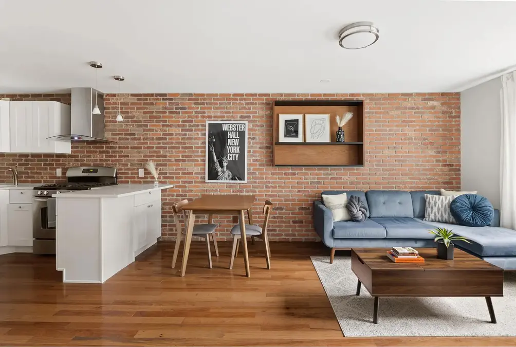 Nolita loft with exposed brick wall and open kitchen
