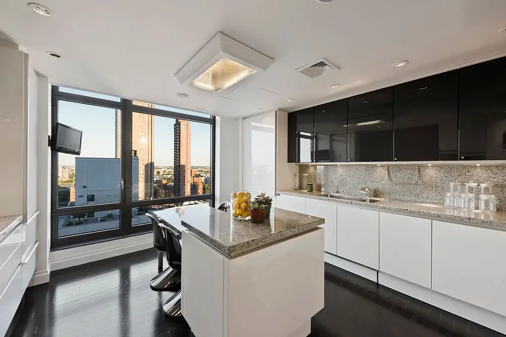 Kitchen with center island and floor-to-ceiling windows
