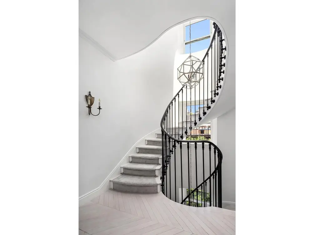 Dramatic staircase connecting all levels