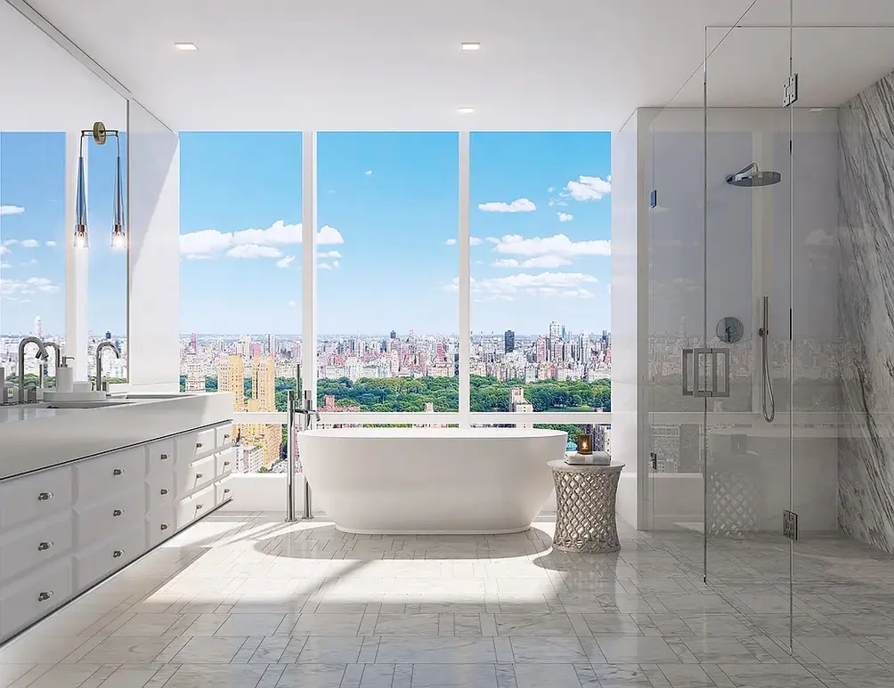 Primary bath with separate soaking tub and Central Park views