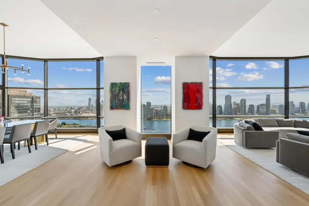 Living/dining room with East River views