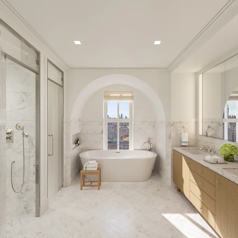 Primary bath with tub in arched alcove