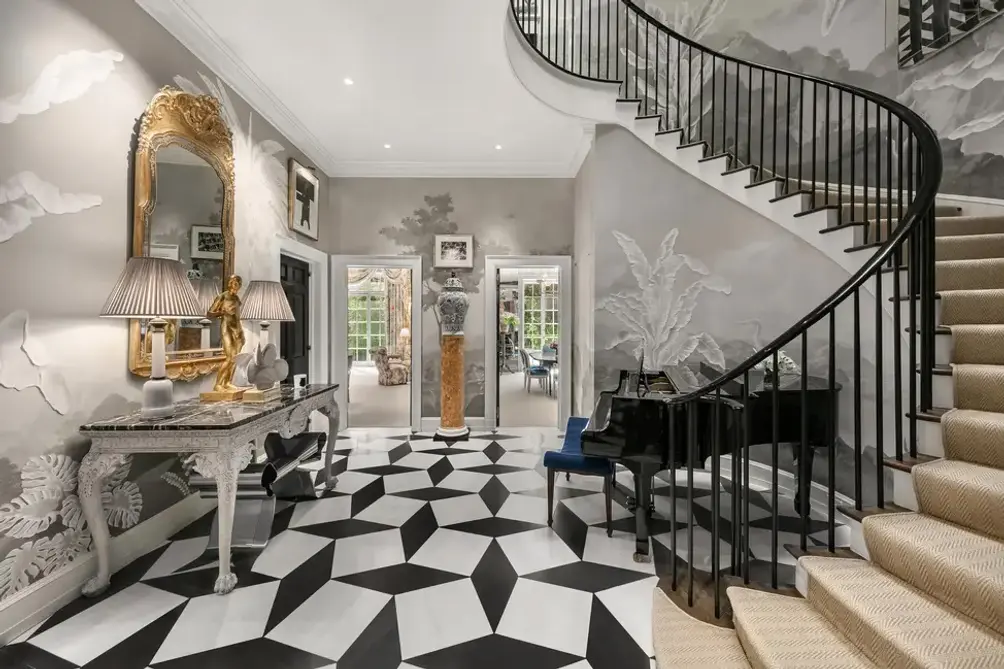 Entrance foyer with dramatic staircase
