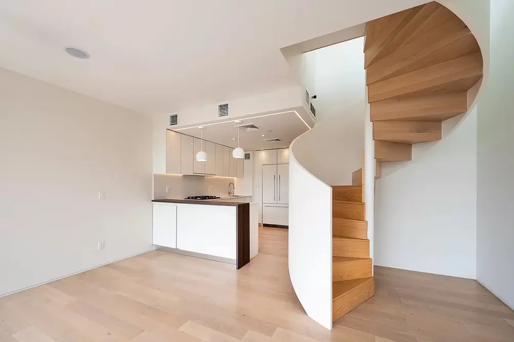 Spiral staircase off the kitchen