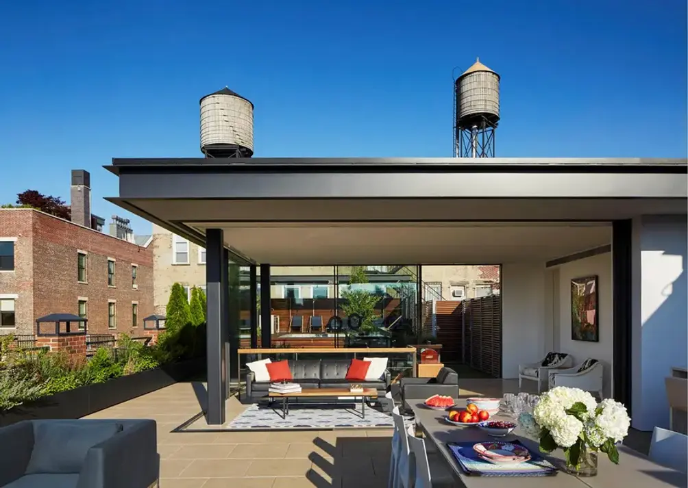 Upper-level sunroom with access to roof terrace