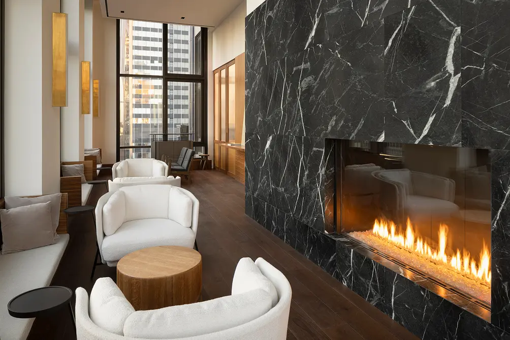 Library with fireplace, NYC condo amenities