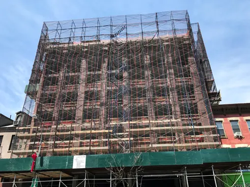 138-142-bowery-construction-tops-out